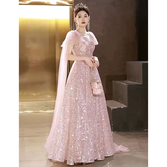 Sleeveless Crew Neck Sequin Sheer Panel Bow Accent A-Line Evening Gown