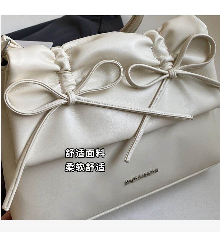 Faux Ribbon Flap Crossbody Bag Leather