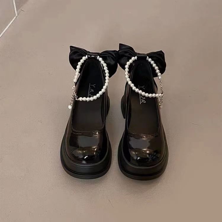 Plain Jane Heel Block Mary Bow Pumps