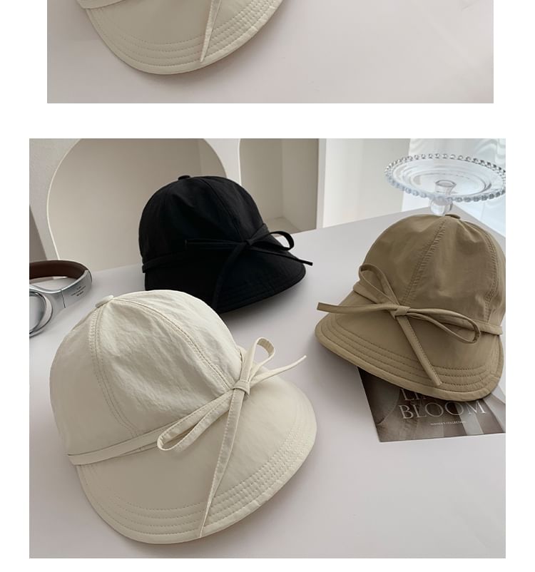 Wide Cap Brim Bow