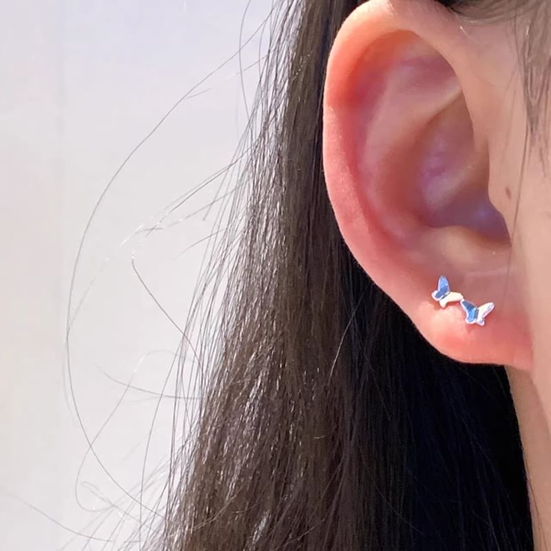 Clous d'oreilles papillon