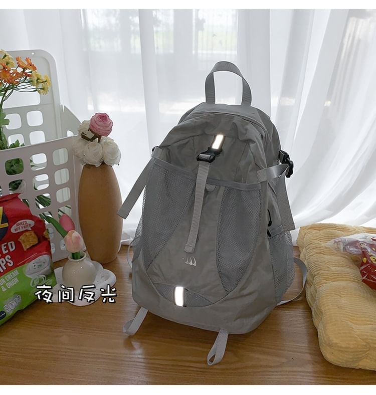 Multi-Pocket Mesh Panel Print Backpack Star