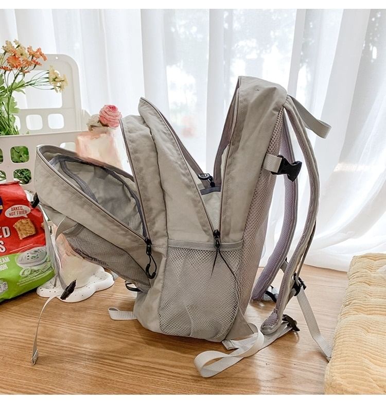 Multi-Pocket Mesh Panel Print Backpack Star