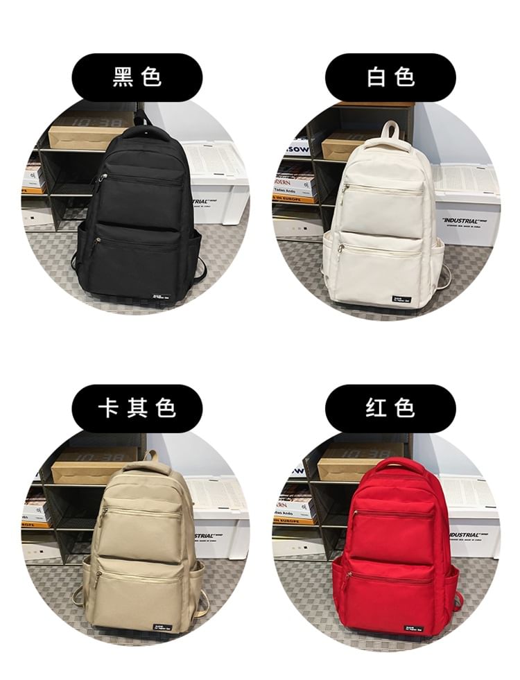 Multi-Pocket Backpack Applique