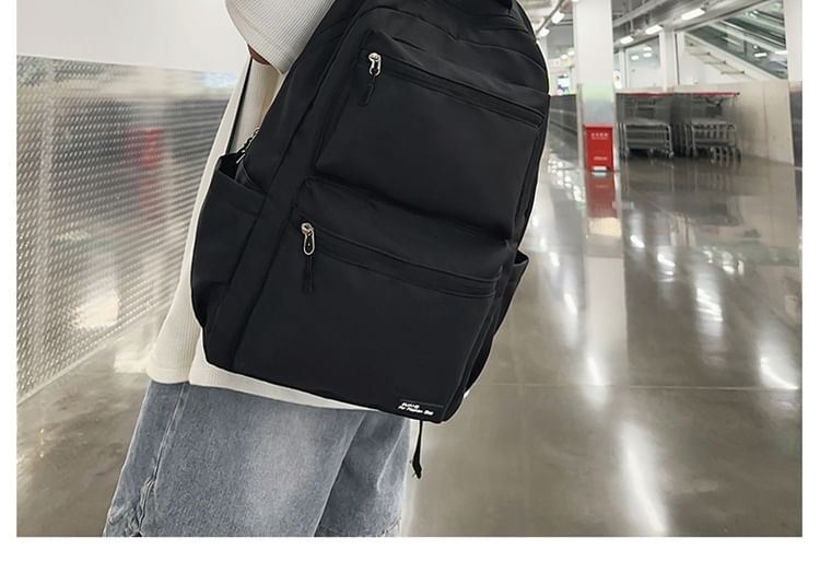 Multi-Pocket Backpack Applique