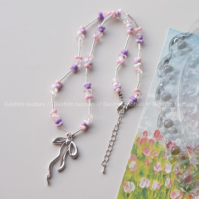 Beaded Pendant Irregular Bow Necklace