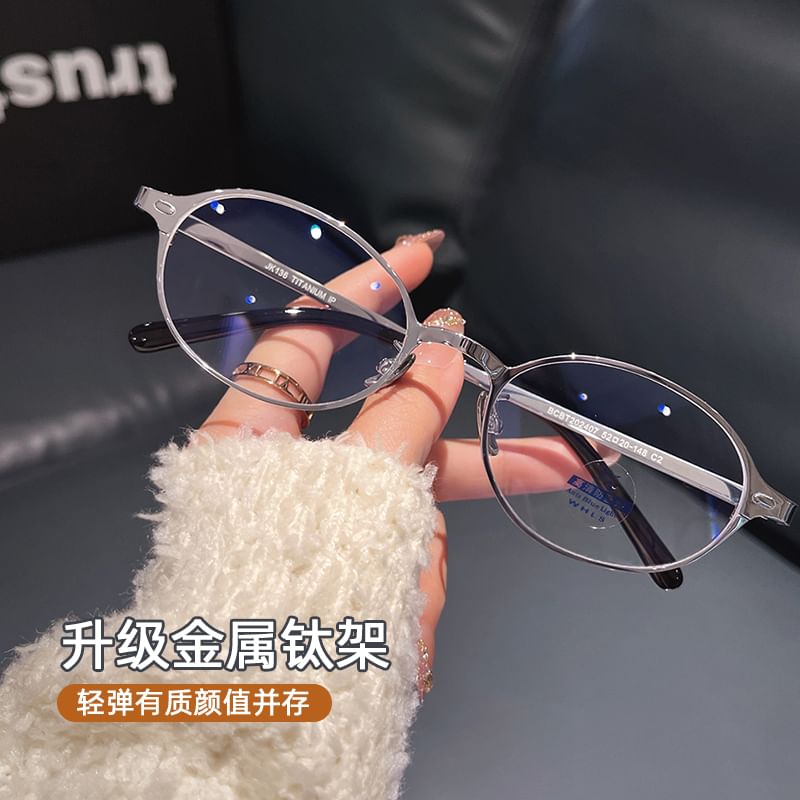 Blue Glasses Blocking Oval Light