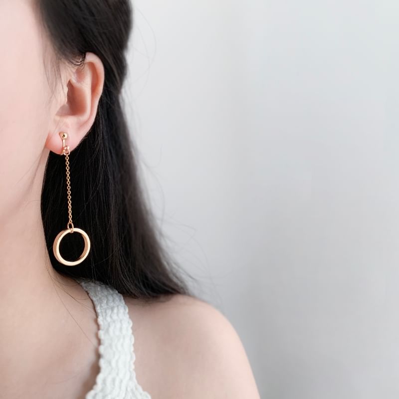 On / Clip Asymmetrical Star Drop Earring