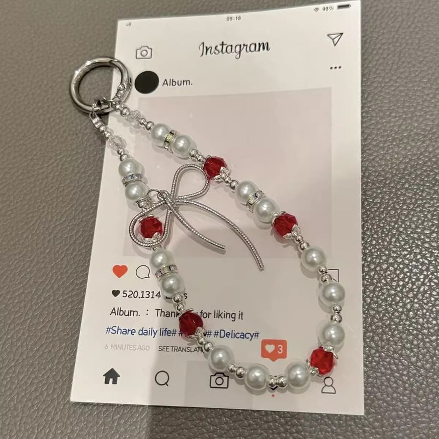 Pearl Faux Strap with Bow Lanyard Phone Pad