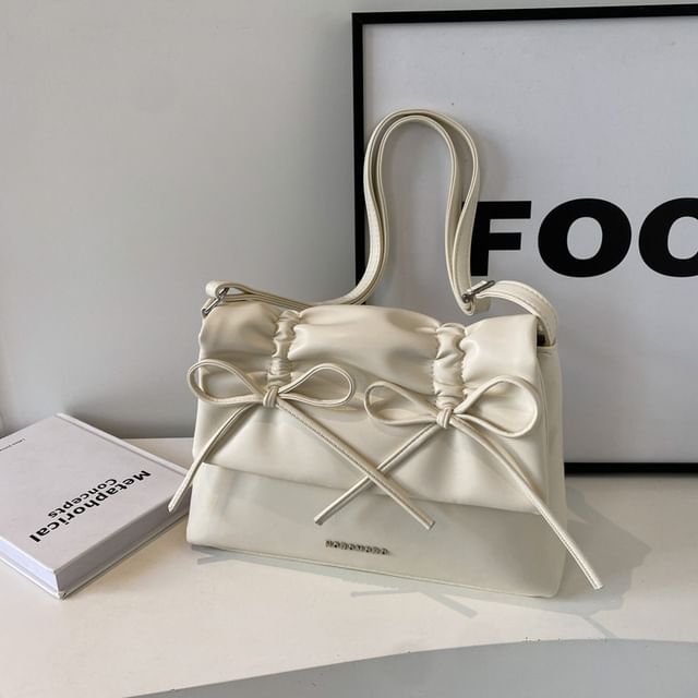 Faux Ribbon Flap Crossbody Bag Leather