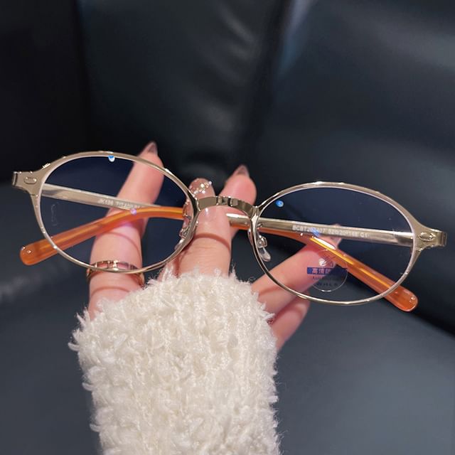 Blue Glasses Blocking Oval Light