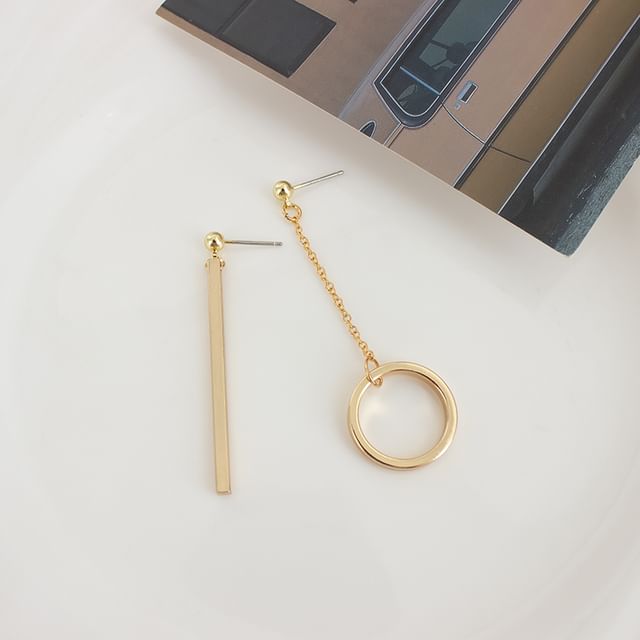 On / Clip Asymmetrical Star Drop Earring