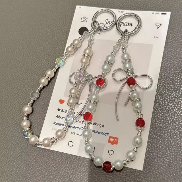 Pearl Faux Strap with Bow Lanyard Phone Pad