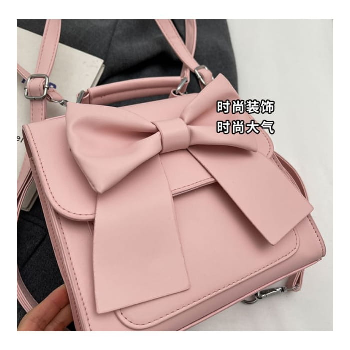 Bow Flap Faux Leather Backpack